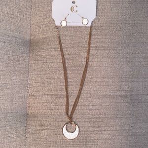 Charming Charlie Gold necklace and earrings set.